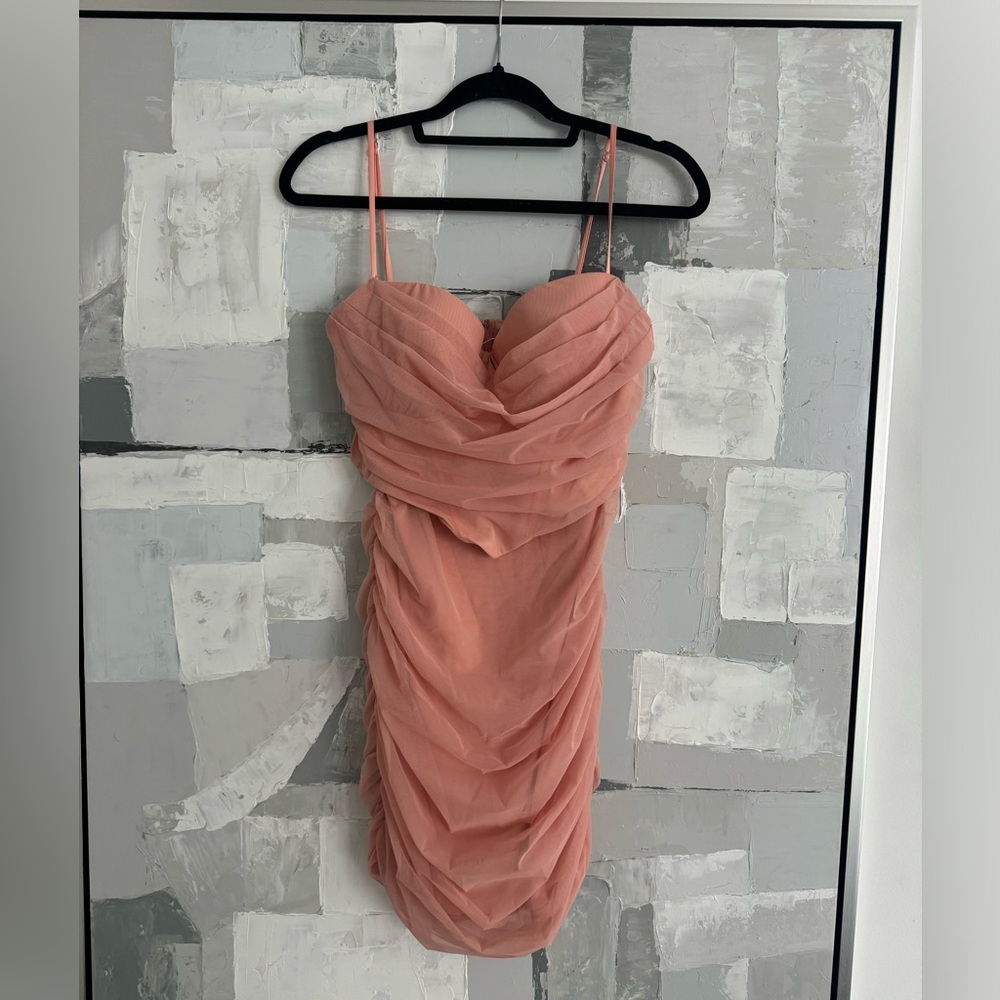 Beautiful Oh Polly salmon color dress.